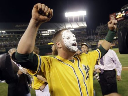 Stephen Vogt celebrates - AP Photo/Marcio Jose Sanchez